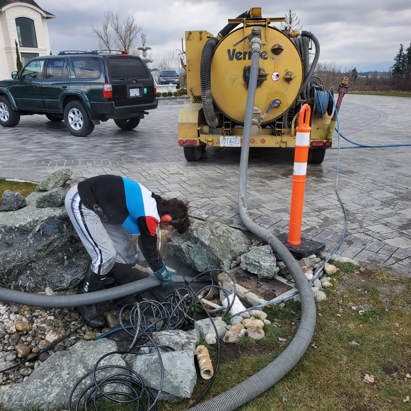 Clearset tech performing a line jetting service