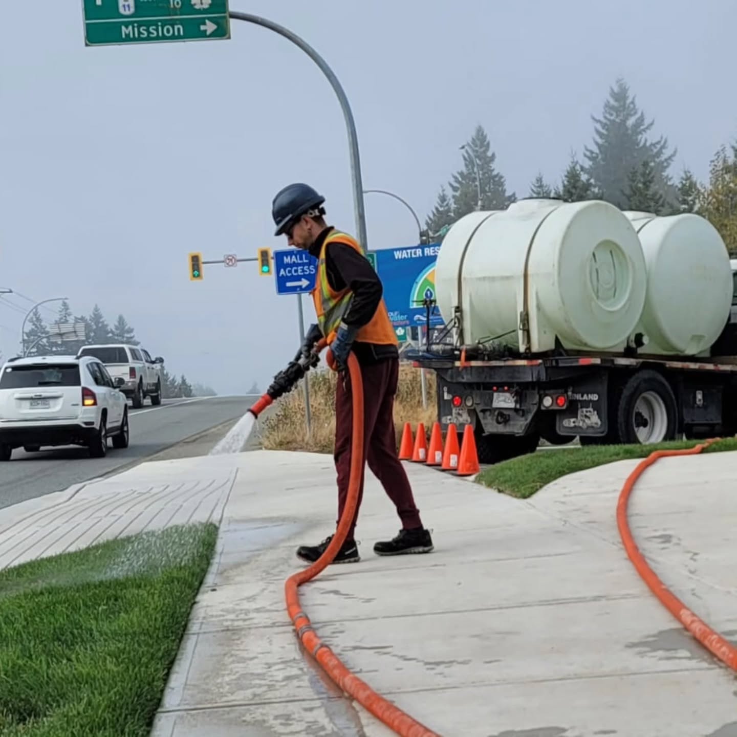 Clearset Vac Truck Services with their truck and tech delivering non-potable water in the Lower Mainland